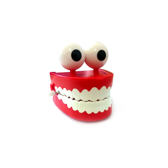 Дитяча іграшка заводна для розваг зуби з очима SY-168
