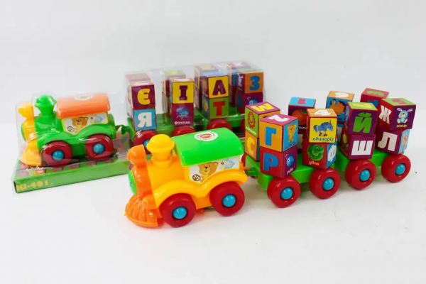 Дитяча іграшка потяг - каталочка (PL-401) кубики з літерами, під слюдою – 38*12*12 см, р-р іграшки –