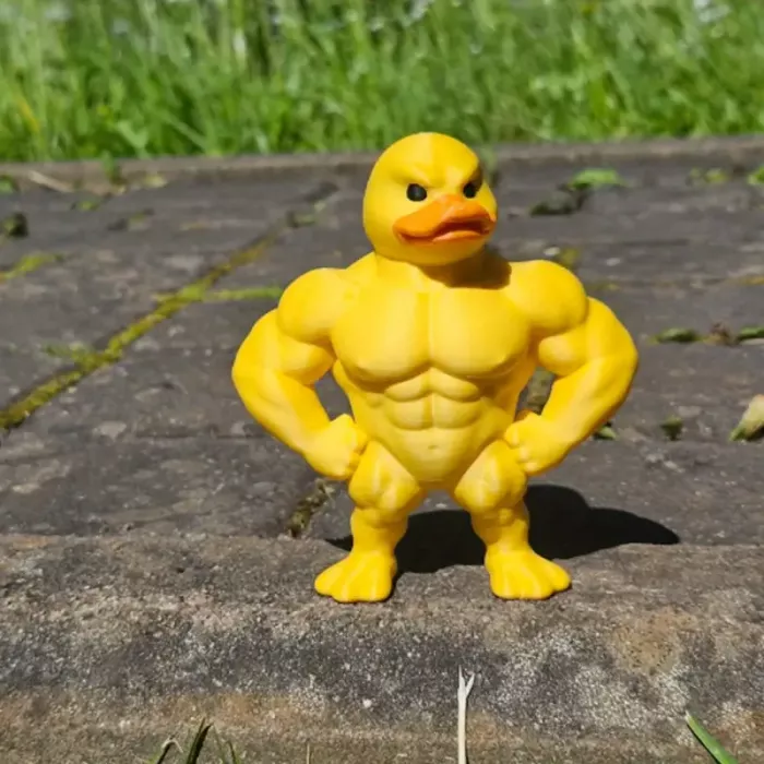 Сувенір іграшка 3D качка бодібілдер культурист фігурка 7 см пластик 3651 (відео в описі)