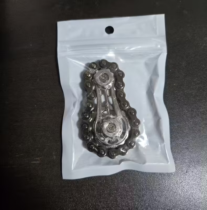 Антистрес іграшка спінер велосипедний ланцюг (4603) колір срібло